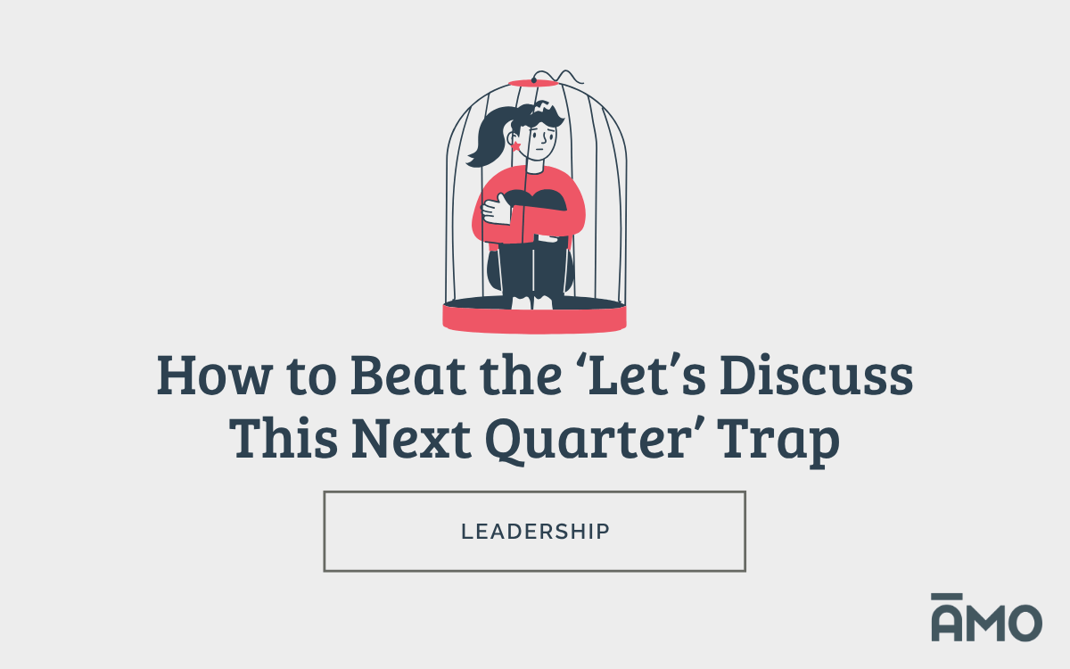 Illustration of a woman sitting inside a birdcage, looking frustrated or stuck, with bold headline text reading “How to Beat the ‘Let’s Discuss This Next Quarter’ Trap” and a button-style label below that says “Leadership,” alongside the AMO logo.